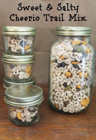 sweet and salty cheerio trail mix in reusable jars