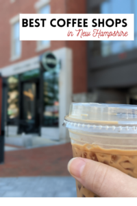 iced latte with coffee shop in background